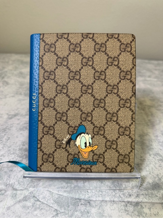 Gucci Accessories - Gucci x Disney GG Supreme Donald Duck notebook